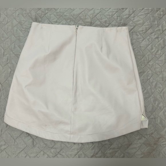 light pink “leather” mini skirt - Picture 2 of 2